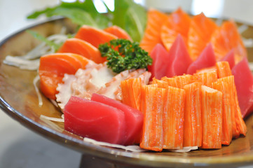 raw salmon and raw squid or sashimi