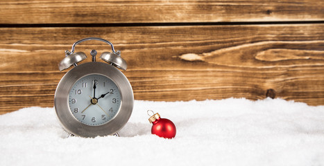 clock with christmas balls for time change