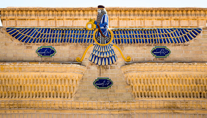 Faravahar, main symbol of persian zoroastrianism on the top of a temple.