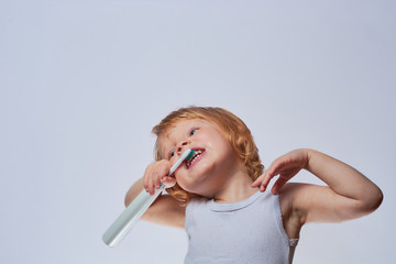 baby brushing her teeth