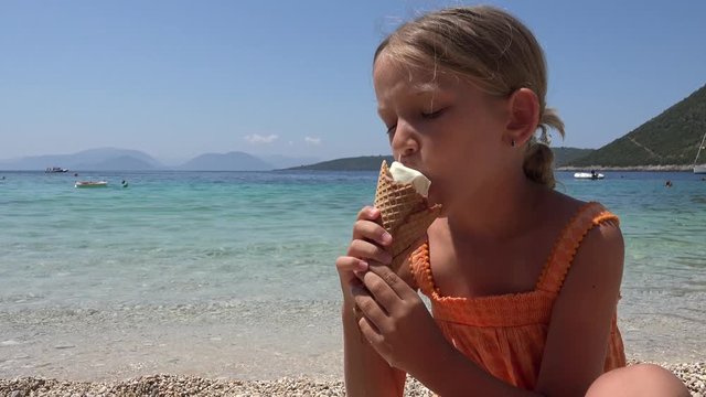 Child Eating Ice Cream on Beach, Girl Portrait on Seashore in Summer Hot Day 4K