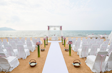 Beach Wedding Ceremony on the beach with sea and sky in romantic