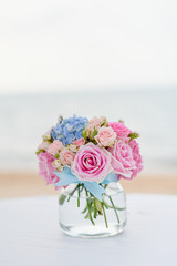 Beach Wedding Ceremony on the beach with sea and sky in romantic