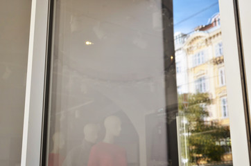 Boutique window from outside. Blank glass for logo or text promotion, mockup.