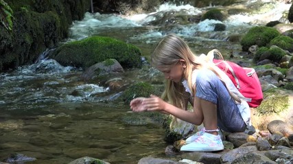 Child Drinking River Water, Kid at Camping in Mountains, Girl in Nature