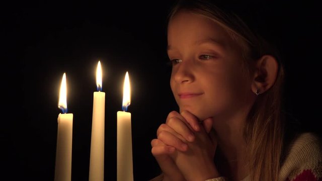 Prayer Child with Candle, Portrait Kid in Night, Happy Girl Face in Dark