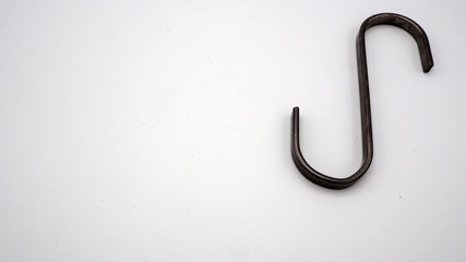 Hanging or hook in s shape design household tool on white background.