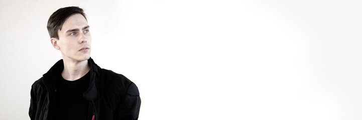 A portrait of a handsome white young man.