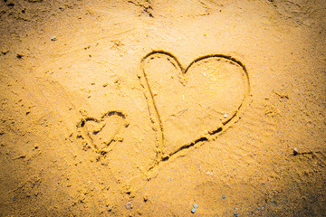 Obraz na płótnie Canvas writing on the sand.