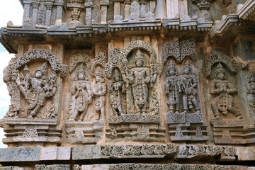 Ornate bas relieif and sculptures of Hindu deities, Kedareshwara Temple, Halebid, Karnataka