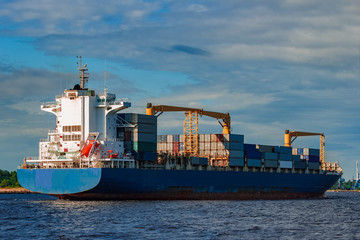 Fototapeta premium Blue container ship underway