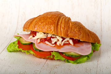 Croissat with ham and cheese