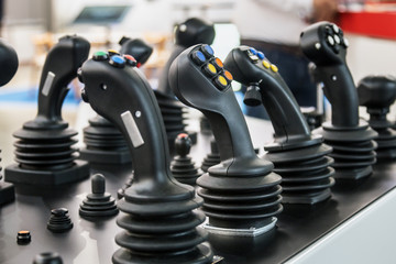 different models of control stick tractor, bulldozer or other construction machinery © OlegDoroshin