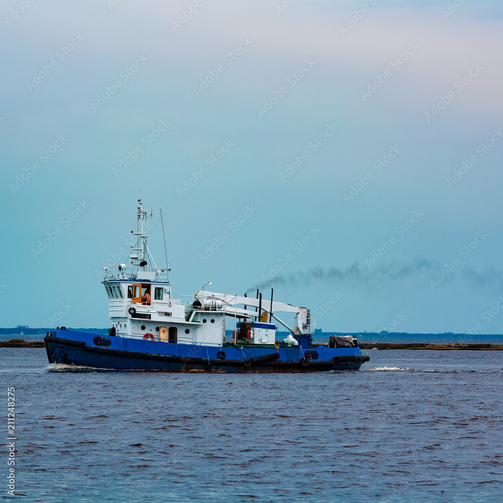 Poster Blue tug ship underway