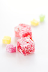 Variety of Turkish Delight Lokum Sweet Turkish delight lokum Traditional dessert White background Vertical