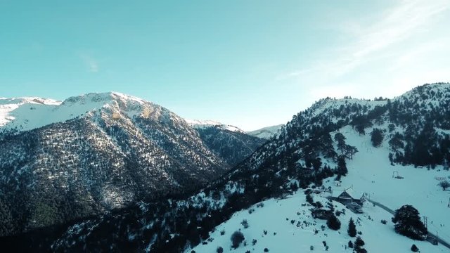 Drone flight in snowy mountains of Greece. Locations - Ziria Ski Center. Multiple moves and shots. Great view.