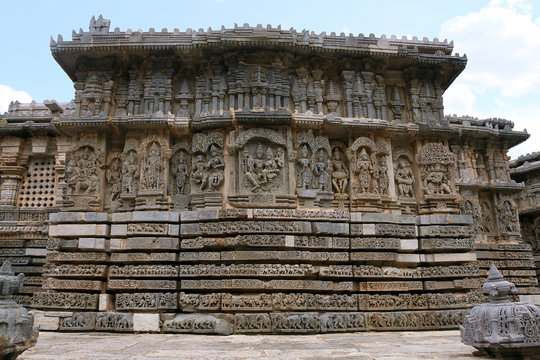 Ornate bas relieif and sculptures of Hindu deities, North wall, Kedareshwara Temple, Halebid, Karnataka