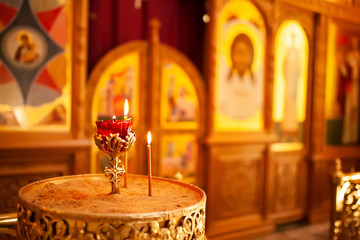 Moscow, Russia, may 26 2018. Candles burning in front of icons in the Orthodox Church
