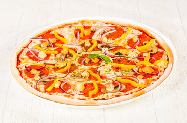 Pizza with salami and mushrooms