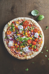 Pizza with vegetables and cheese