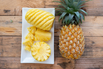 Pineapple on the wood  background