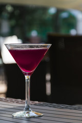 purple cocktail on the table