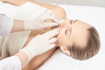 Obraz na płótnie Canvas Sugar hair removal from woman body. Wax epilation spa procedure. Procedure beautician female. Mustache