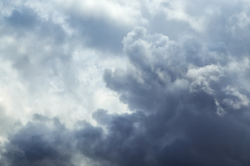 Naklejka na ściany i meble Background of storm clouds before a thunder-storm