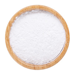 White rice flour powder in wooden bowl isolated on white. Top view.