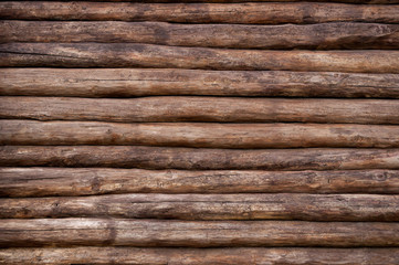 the wall of a log house - Powered by Adobe