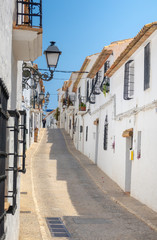 Obraz premium Charming street in a white village, White Coast of Spain
