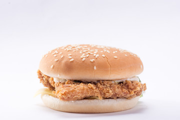 Crispy chicken burger with lettuce, cheese, and mayonnaise