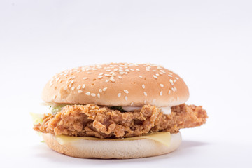 Crispy chicken burger with lettuce, cheese, and mayonnaise