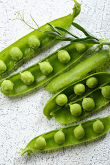organic green peas on stone