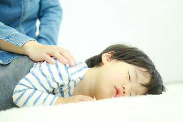 Obraz na płótnie Canvas 眠る子供
