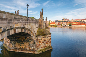 Famous iconic image of Charles bridge, Prague, Czech Republic. Concept of world travel, sightseeing and tourism.