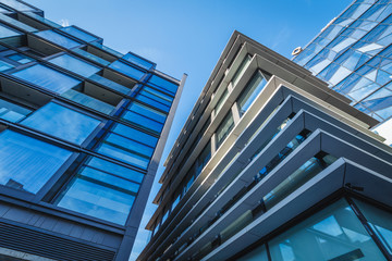 Abstract architecture background, glass wall of modern office buildings in Prague