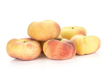 Fresh ripe Saturn peaches isolated on white background.