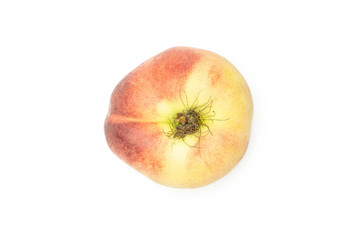 One fresh ripe Saturn peach flatlay isolated on white background.