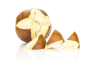 One Bavarian bread bun and three slices isolated on white background fresh baked loaves.