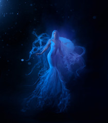 A jellyfish girl floating in levitation on a dark ocean floor. A beautiful, white dress and a hat...