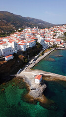 Fototapeta na wymiar Aerial drone bird's eye view of iconic and picturesque Andros island chora, Cyclades, Greece