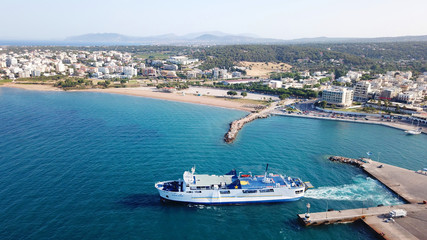 Aerial drone bird's eye view of famous port of Rafina with passenger ferries travel to Aegean...