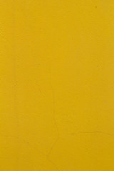 Background of yellow concrete wall shallow texture. External decoration of the building walls