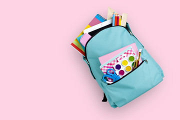 Fototapeta Full school backpack isolated on pink background obraz