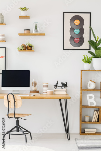 Real Photo Of A Computer Screen On Desk Standing Next To Chair Real Photo Of A Computer Screen On Desk Standing Next To Chair And
