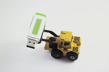 Toy dozer machine which held a flashdisc to the upside