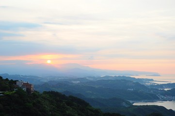 Beautiful sunset and night view of coastline at evening in Jiufen, Taipei, Taiwan