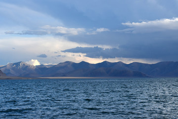 Western Tibet. Sacred lake Dangra (Dang Ra Gyu Tso) in summer evening in cloudy weather