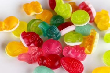 colored rubber candies in a white bowl.